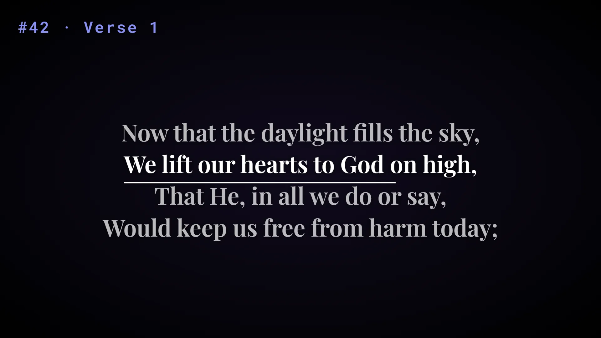 The projector during an accompanied hymn: four lines of a stanza, the second one at full strength with a thin rule beneath it filled about four-fifths of the way along, the other three standing very slightly back
